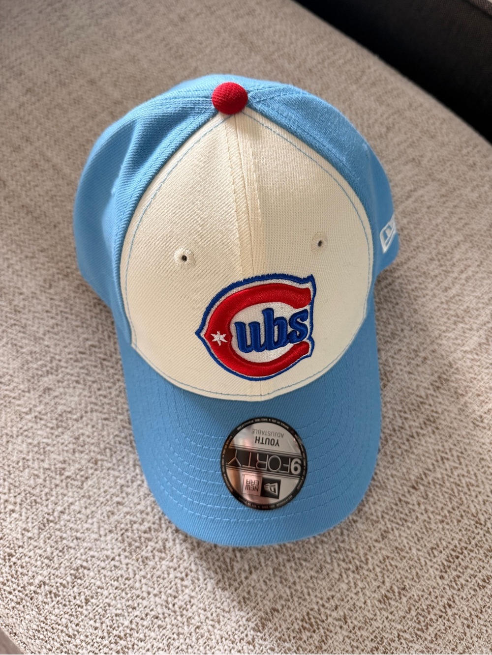 New Era Youth Light Blue and Cream Baseball Hat with Red Accent
